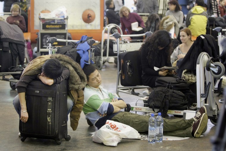 Image: Passengers rest on a floor of Shremetyevo international airport
