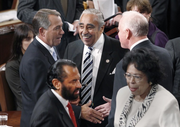 Image: Incoming House Speaker Boehner is greeted by Rangel as he arrives on the House floor on the opening day of the 112th United States Congress in Washington