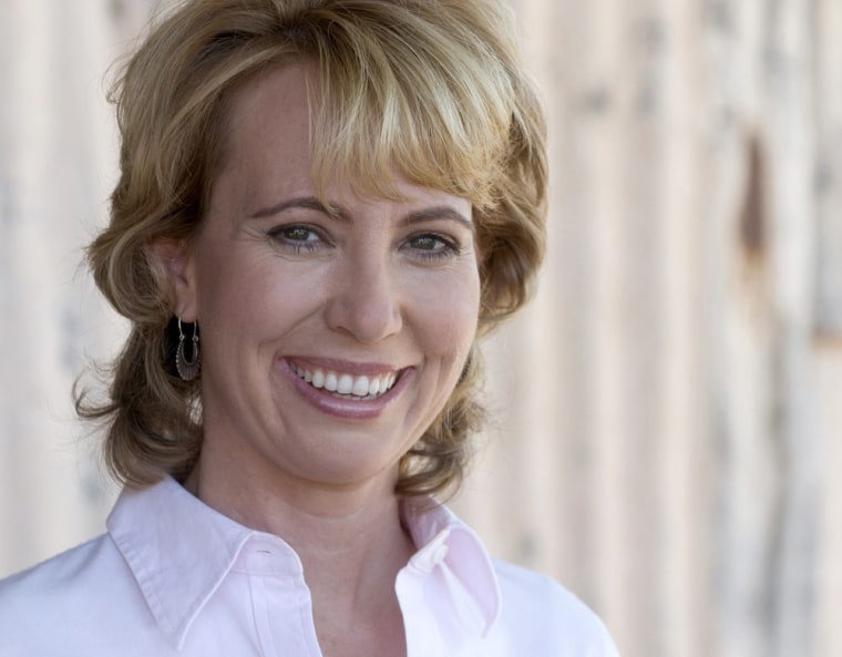 Image: U.S. Representative Gabrielle Giffords is seen with her husband Mark Kelly in an undated handout photo