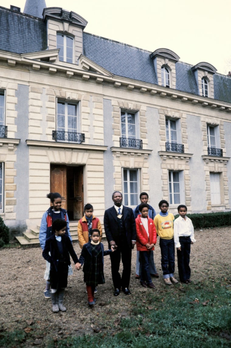 Image:  Jean-Bedel Bokassa posing with family members at the Hardricourt castle