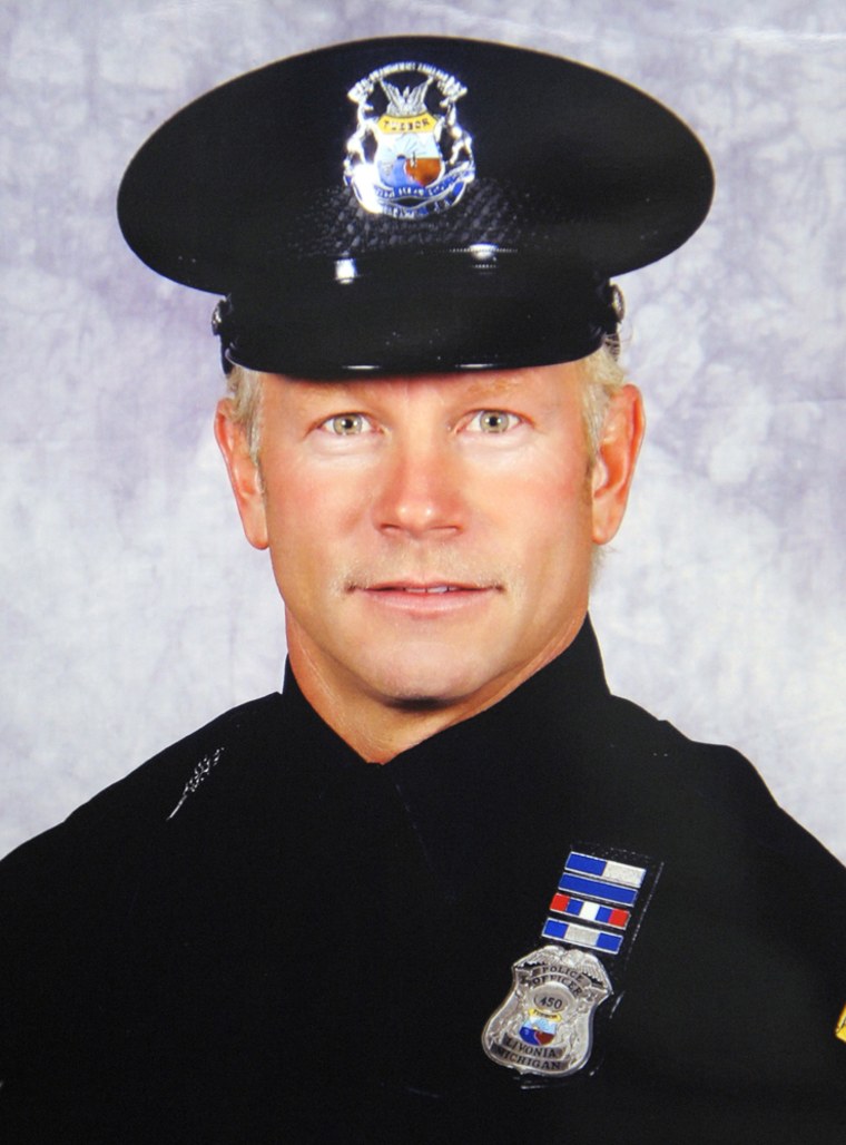 Livonia, Mich., police officer Larry Nehasi, 48, was killed Monday night in Walled Lake by a gun police say was just stolen by two brothers burglarizing a home.