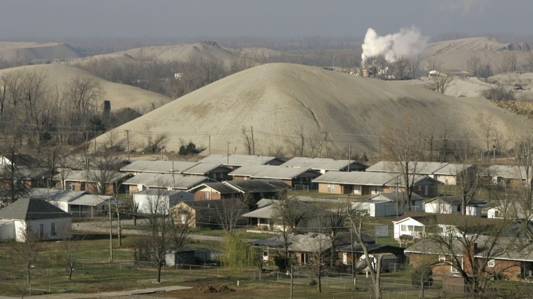 Image: Picher, Okla., is nestled among huge lead-laced piles of rock