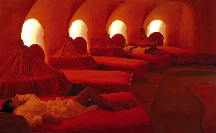 The Corallium Spa's "womb room" at the Lopesan Cota Meloneras resort is decorated in pink and red hues.