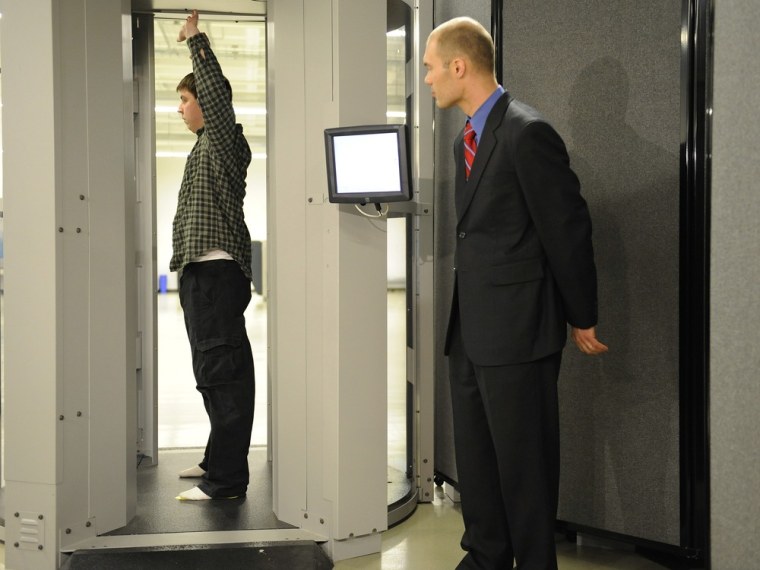 Image: Transportation Safety Administration employees demonstrate new body scanner software at the TSA Systems Integration Facility in Arlington