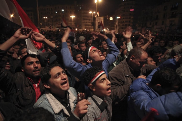 Image: Egyptians in Cairo's Tahrir Square react to Mubarak's speech