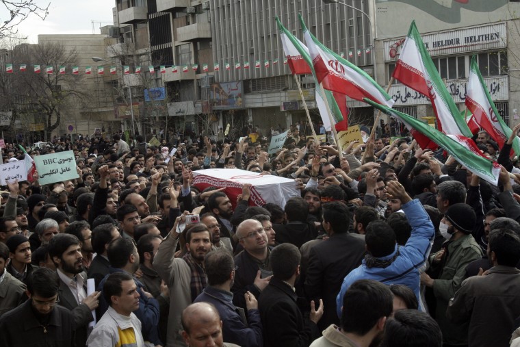 Image: People take part in the funeral of Sanee Zhaleh in Tehran