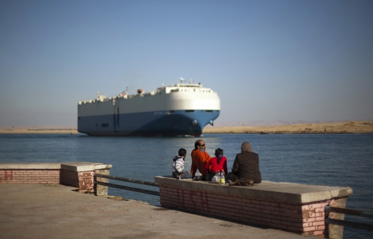 Image: Cargo ship transits Suez Canal