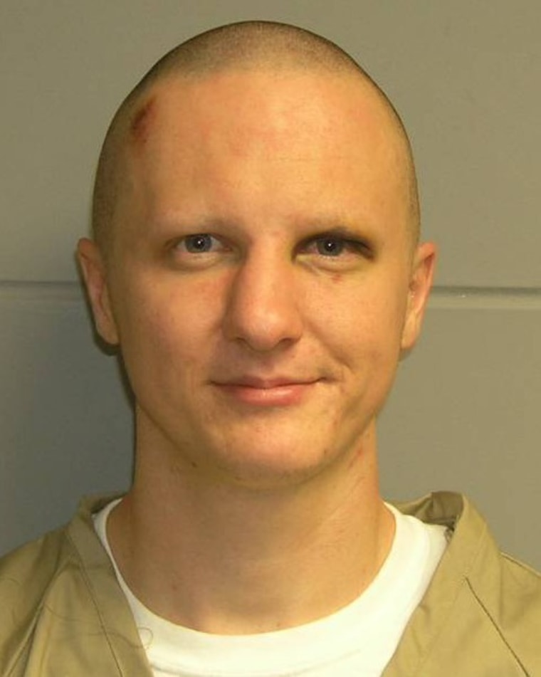 Image: One of two original booking photos of Jared Laughner
