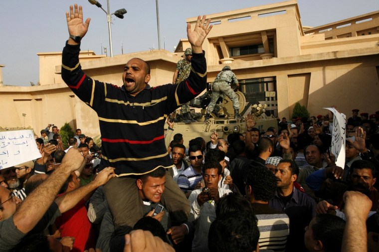 Image: Egyptian protesters chant slogans during