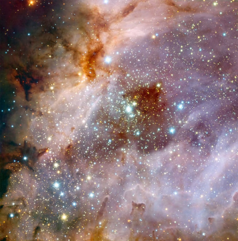 Astronomers using data from ESO's Very Large Telescope created this composite photo of the nebula Messier 17, also known as the Omega Nebula or the Swan Nebula. The image shows vast clouds of gas and dust illuminated by the intense radiation from young stars.