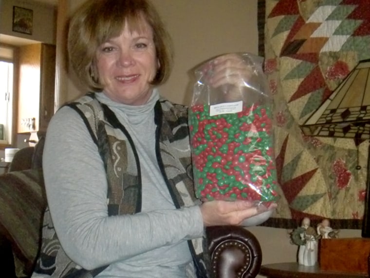 Please find attached a pic of me, my bag 'o candy (woo hoo) and the \"info\" label.