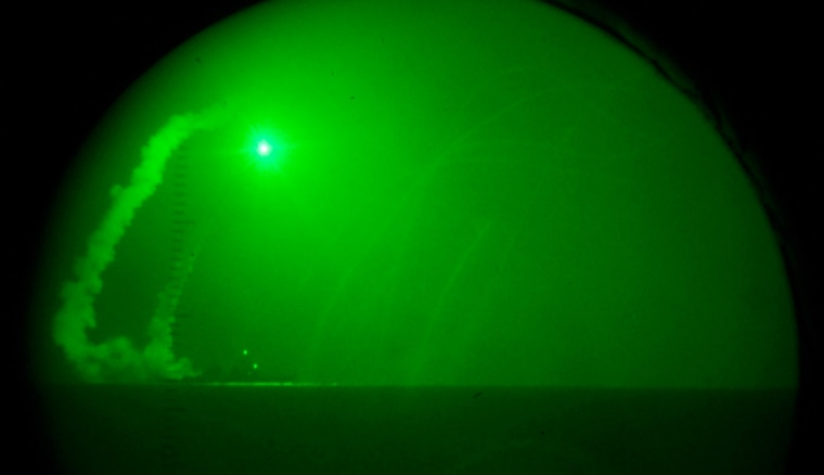 The USS Barry fires Tomahawk cruise missiles during Operation Odyssey Dawn on March 19. 