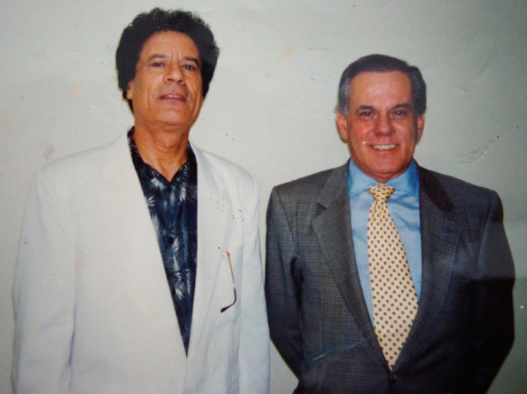 Libyan leader Moammar Gadhafi, left, and Brazilian plastic surgeon Dr. Liacyr Ribeiro pose for a photo in Tripoli, Libya in 1994.