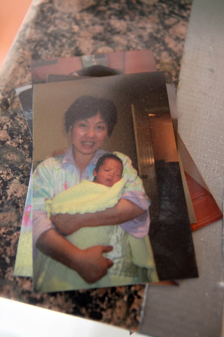 Image: A photograph found on a kitchen countertop in a townhouses believed to be used by Chinese mothers to birth their children in the U.S. for the purpose of citizenship, in San Gabriel, Calif.