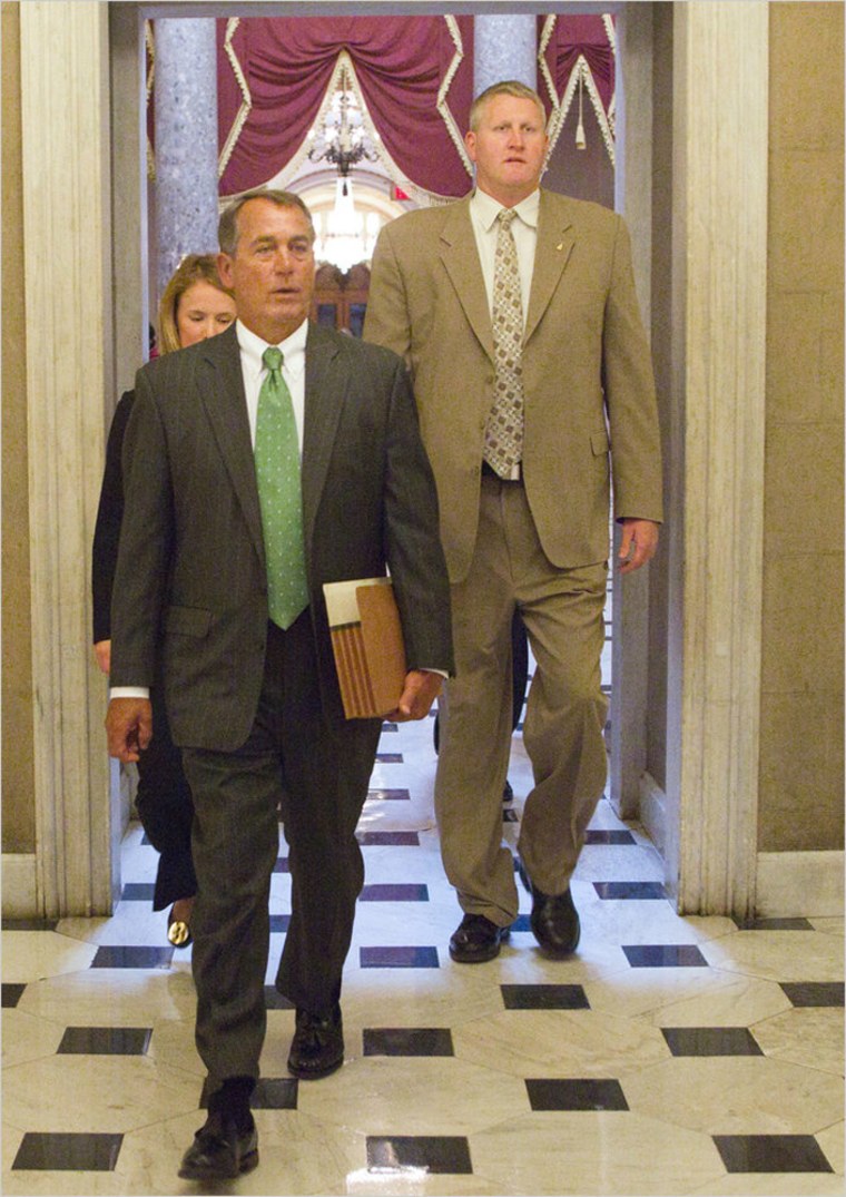 Image: John A. Boehner, the new House speaker, made his way back to his offices on Tuesday after attending an event with Chief Justice John G. Roberts Jr.