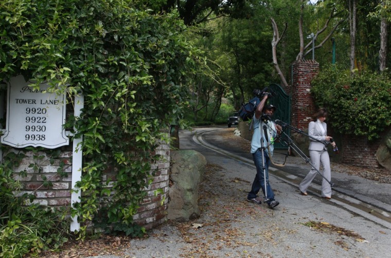 Image: A television news crew leaves the site of a proposed mega-mansion in the Benedict Canyon area of Beverly Hills, Calif.