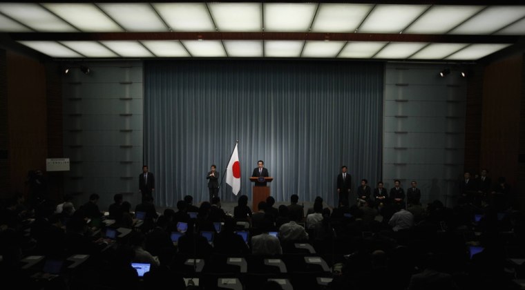 Image: Japan's Prime Minister Naoto Kan speaks during a news conference at his official residence in Tokyo
