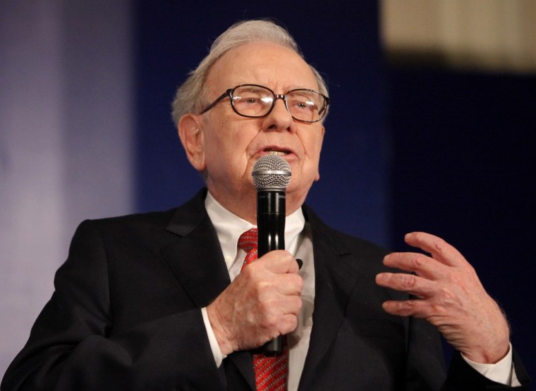 Image: Billionaire Buffett speaks during a news conference in New Delhi