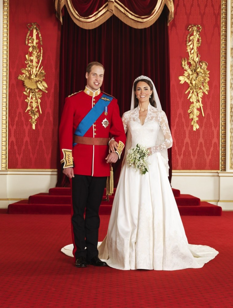 Image: Britain's Prince William posing with his wife Kate, Duchess of Cambridge