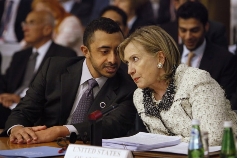 Image: United Arab Emirates' Foreign Minister Nahyan speaks with US Secretary of State Clinton before a meeting in Rome