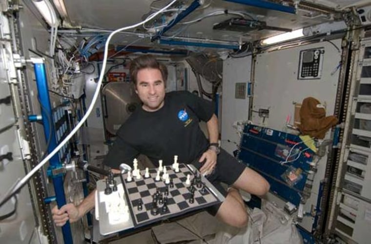 NASA astronaut Greg Chamitoff, Expedition 17 flight engineer, took on Earth in a chess match from the International Space Station in July 2008. He lost, but now he and fellow astronaut Greg Johnson are ready for a rematch.