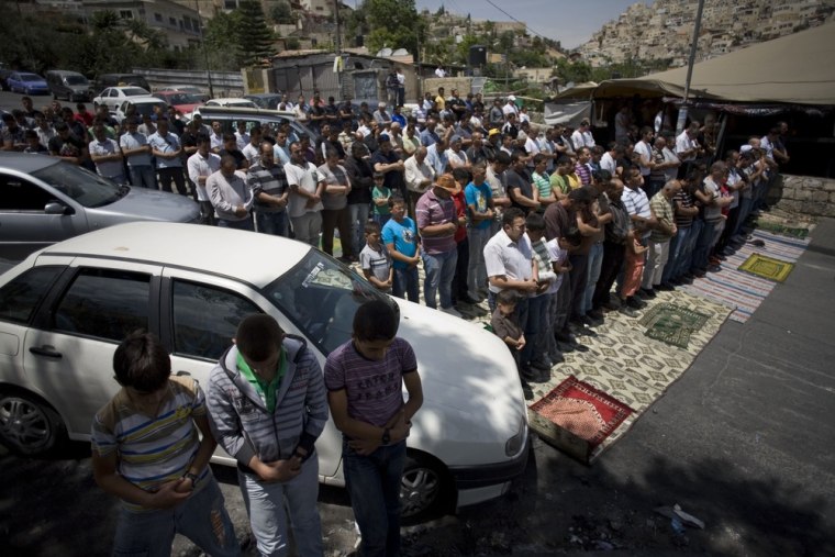 Image: Palestinian Muslims praying in Jerusalem