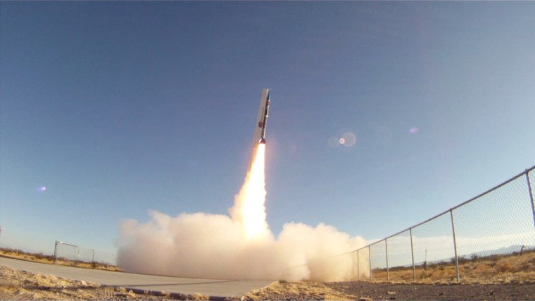 A suborbital UP Aerospace rocket soars on its May 20 launch, pushing an eclectic mix of payloads to the edge of space on a suborbital trajectory. The rocket carried student experiments, cremated human remains and wedding rings on the short spaceflight.