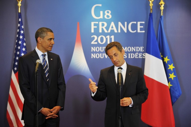 Image: U.S. President Obama and France's President Sarkozy attend a bilateral meeting on the sidelines of the G8 summit in Deauville