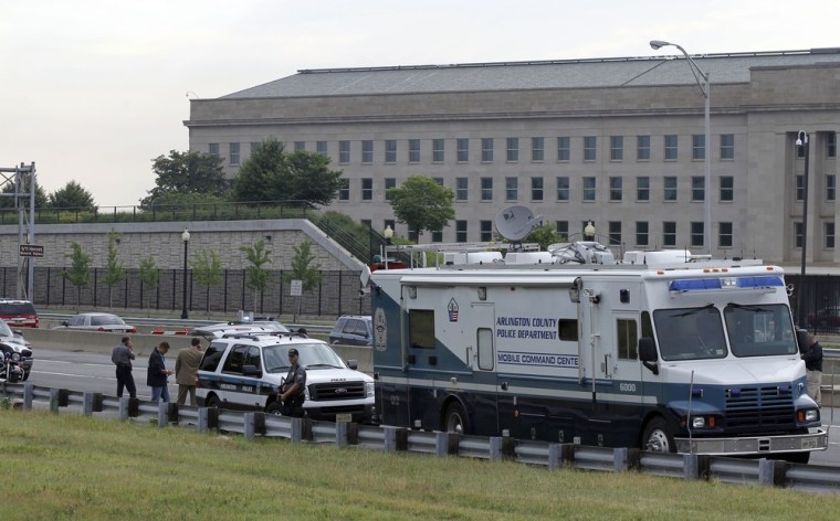 Image: Law enforcement work near the Pentagon after a suspicious vehicle forced multiple road closures