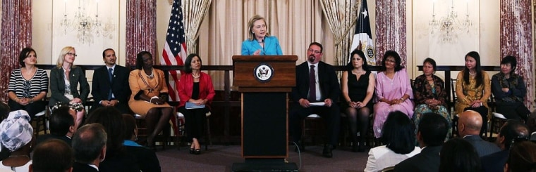 Image: Clinton discusses 2011 trafficking in persons report