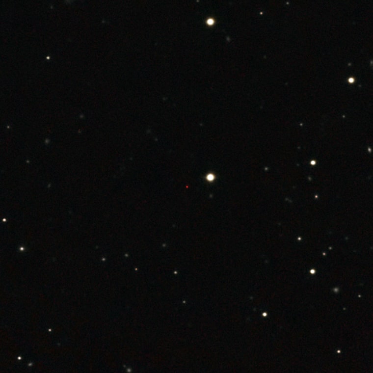This image of ULAS J1120펮, a very distant quasar powered by a black hole with a mass two billion times that of the Sun, was created from images taken from surveys made by both the Sloan Digital Sky Survey and the UKIRT Infrared Deep Sky Survey. The quasar appears as a faint red dot close to the centre. This quasar is the most distant yet found and is seen as it was just 770 million years after the Big Bang.