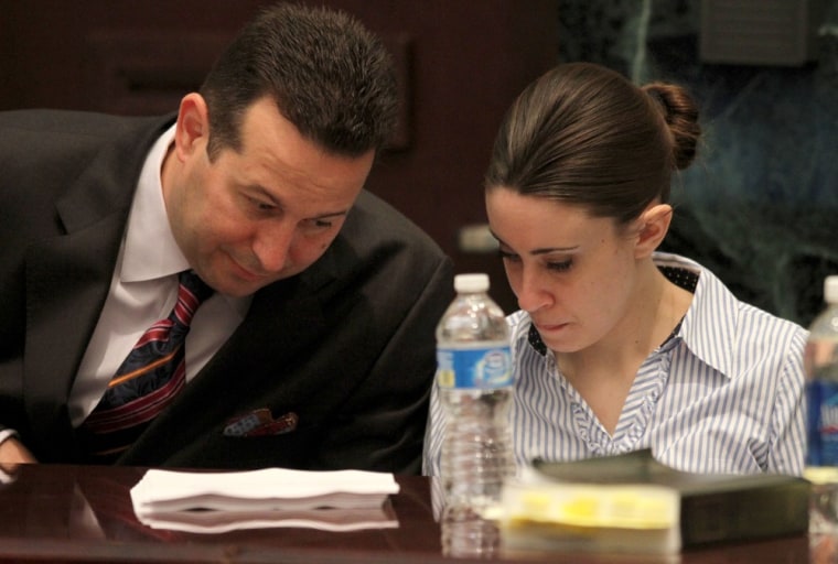 Image: Defense attorney Jose Baez with his client Casey Anthony