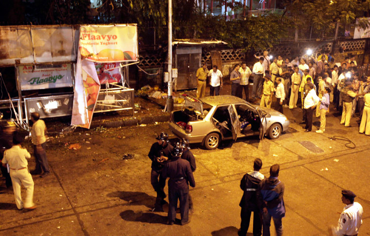 Image: Police inspect the site of an explosion at Dadar in Mumbai, India, Wednesday
