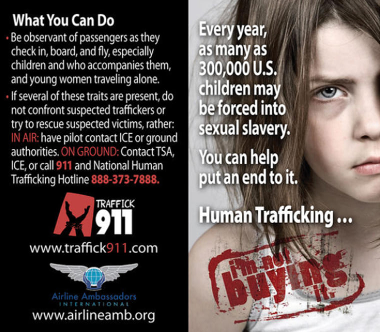 An Airline Ambassadors International poster raises awareness on the issue of human trafficking, which enslaves up to 27 million adults and children worldwide.