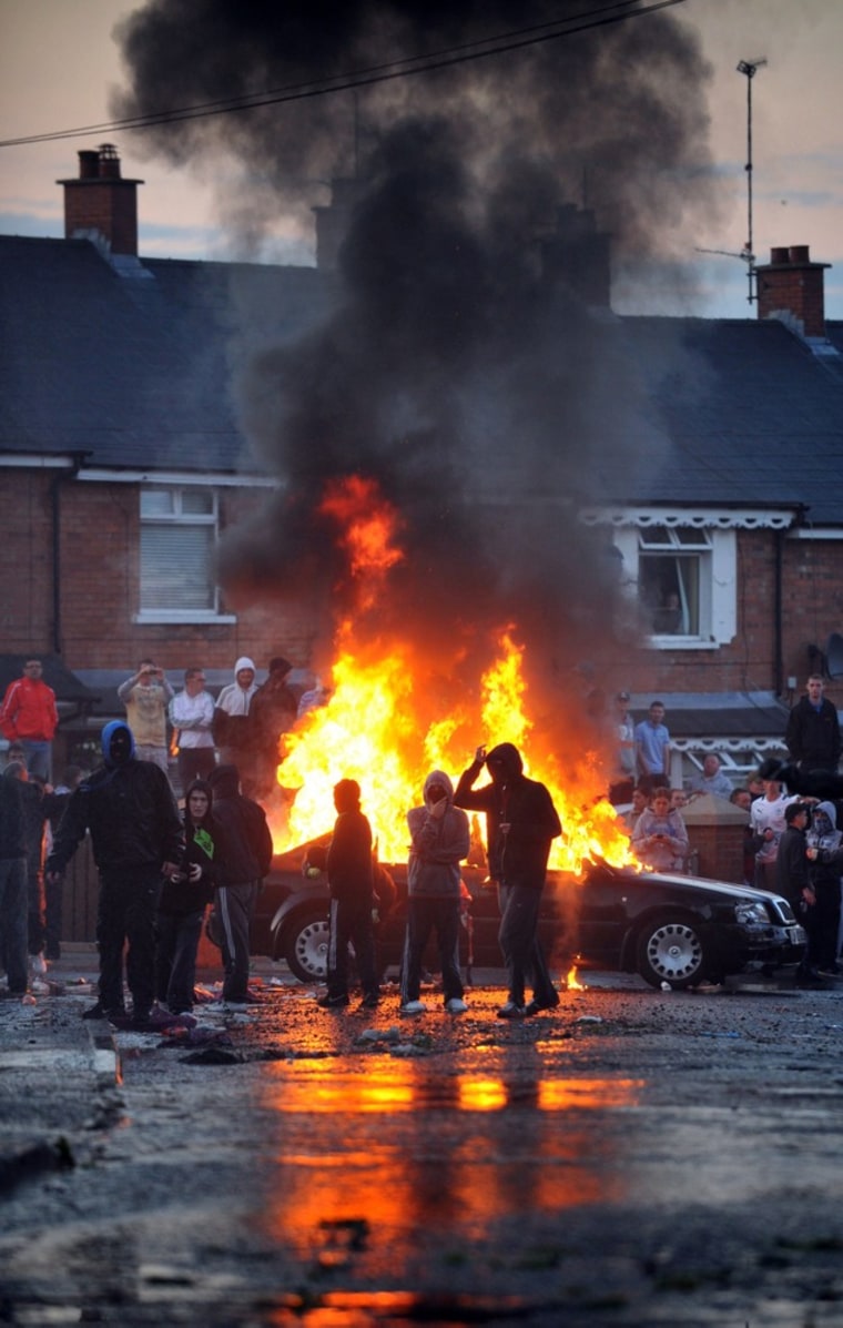 Image: Nationalist Youths throw rocks and petrol bombs at police during serious rioting in Belfast