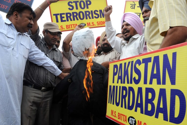 Image: Indian protesters  burn effigy of a terrorist