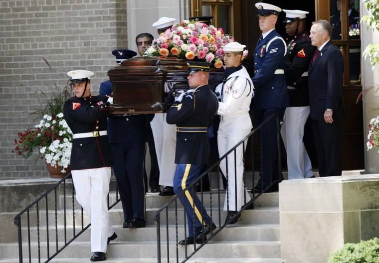 Image: Military pallbearers carry the casket of the former US first lady Betty Ford out of the Grace Episcopal Church after a private funeral service in East Grand Rapids, Michigan