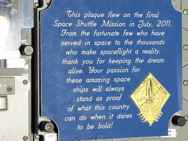 The plaque left on board Atlantis by the astronauts who flew the final mission of the space shuttle, STS-135, this month.