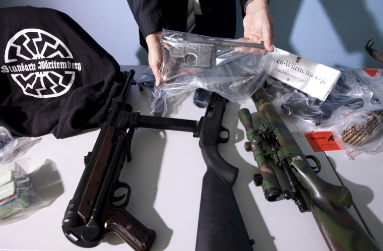 Image: Police in Stuttgart shows seized weapons after a series of raids on the homes of far-right extremists