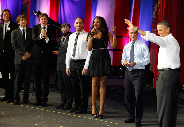 Image: US President Obama listens as performers sing \"Happy Birthday\" to him