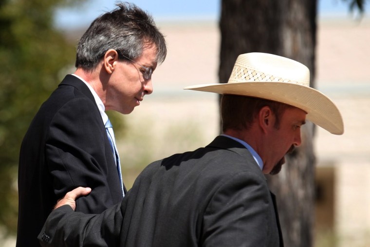Image: Warren Jeffs is led out of the Tom Green County Courthouse in San Angelo, Texas