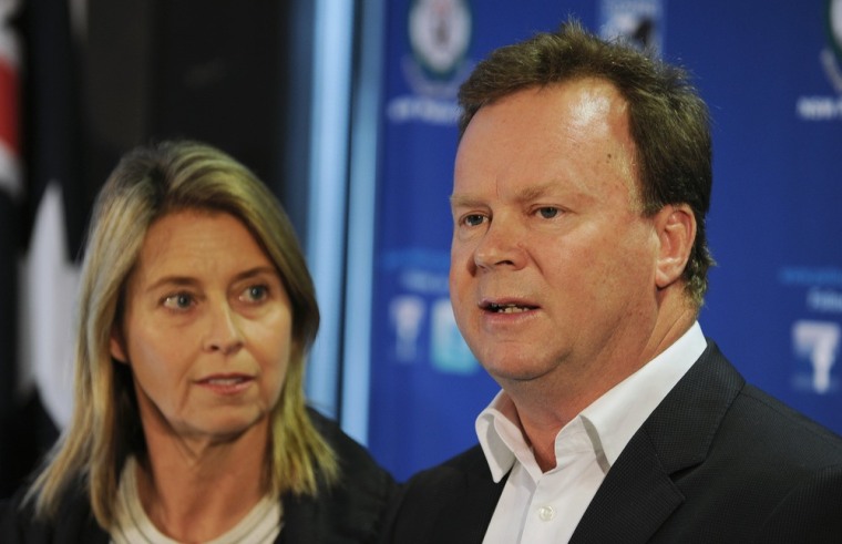 Image: Bill Pulver, accompanied by his wife Belind, speaks at a press conference in Sydney