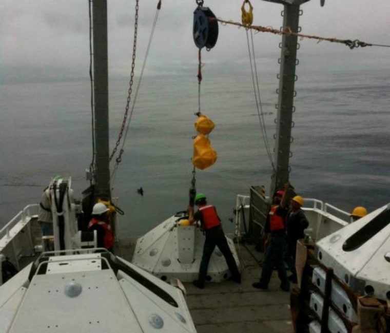 Image: An ocean bottom seismometer is readied
