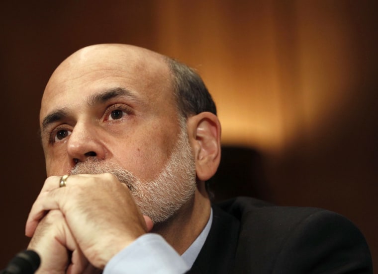 Image: Ben Bernanke listens while testifying before the Senate Banking, Housing and Urban Affairs Committee in Washington