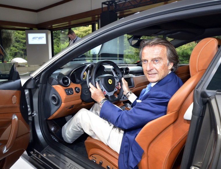 Image: Italian automaker Ferrari representative Luca di Montezemolo displays Ferrari's first four wheel drive vehicle,