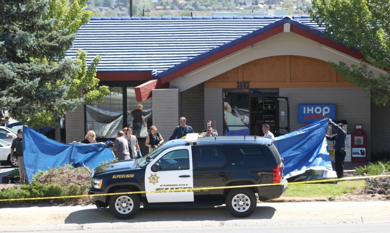 Image: Officials investigate the scene of a shooting in an IHOP restaurant in Carson City, Nev.