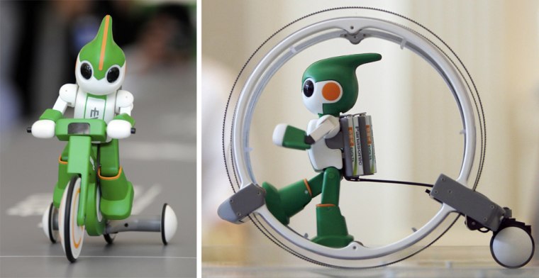 Image: Panasonic's \"Evolta\" running robot is demonstrated in Tokyo