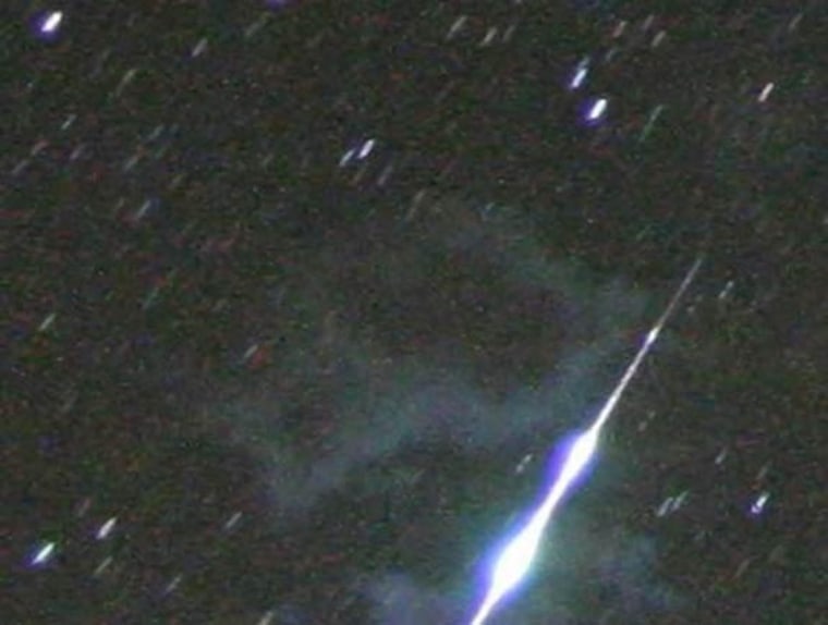 This early Perseid meteor shower fireball, with a smoke trail, was filmed from Ozark, Ark., just after midnight on July 26, 2009. Could it have been the source of a boom?
