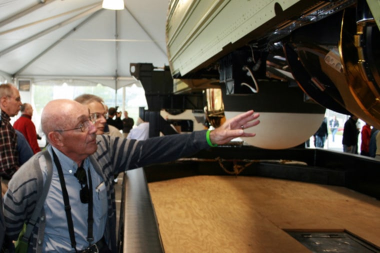 Phil Presser, one of the developers of the KH-9 Hexagon's panoramic camera system, proudly points out some of the spacecraft's once highly-classified features, a life's work that he had been unable to discuss publicly until the NRO's Sept. 17 declassification of the massive spy satellite.