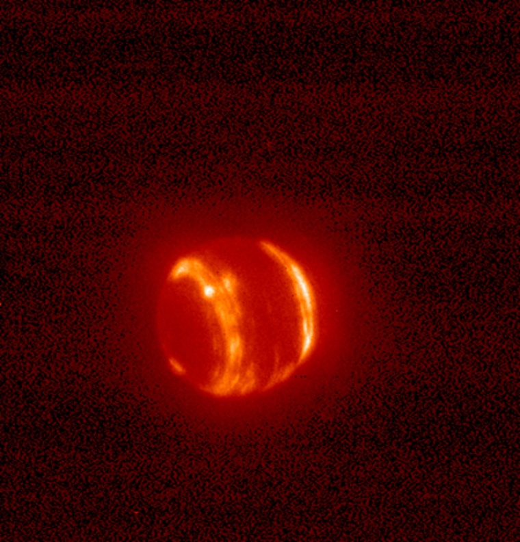 A shot of Neptune in infrared light, captured using the adaptive optics system at Hawaii's Keck Observatory.